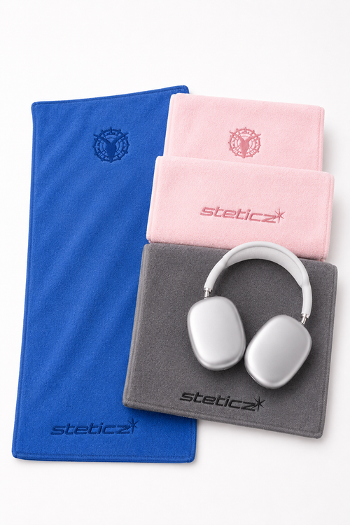 Lumigym STETICZ gym towel with logo, soft cotton fabric, folded for workout or gym use.